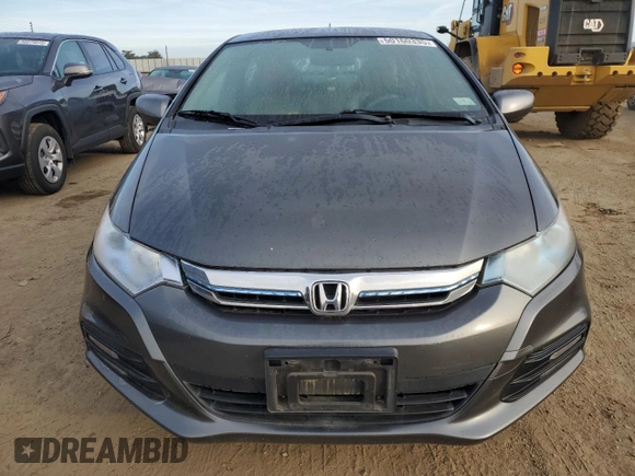 2012 Honda Insight z VIN JHMZE2H32CS000284, wystawiony jako Copart lot #50160335 z przebiegiem 64 074 mil mil oraz Szkoda całkowita • Salvage title. Historia ofert i sprzedaży dostępna na DreamBid. Obrazek 5.