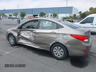 2014 Hyundai Accent GLS z VIN KMHCT4AE4EU758926, wystawiony jako IAAI lot #42451816 z przebiegiem 80 387 mil mil oraz . Historia ofert i sprzedaży dostępna na DreamBid. Obrazek 3.