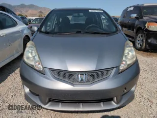 2010 Honda Fit Sport with VIN JHMGE8H41AC002070, listed as a Copart auction lot 62356565 with 148,279 mi miles and Salvage title. Bid and sale history available at DreamBid. Image 5.