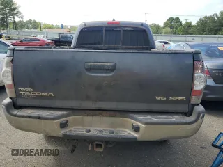 2014 Toyota Tacoma with VIN 5TFMU4FN3EX025697, listed as a Copart auction lot 62146895 with 133,028 mi miles and Salvage title. Bid and sale history available at DreamBid. Image 6.