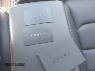 2020 Tesla Model Y Long Range with VIN 5YJYGDEE0LF041762, listed as a IAAI auction lot 40556913 with Not Provided miles and . Bid and sale history available at DreamBid. Image 11.