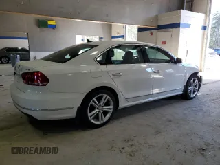 2015 Volkswagen Passat SE with VIN 1VWBS7A36FC005034, listed as a Copart auction lot 47081545 with 147,810 mi miles and Salvage title. Bid and sale history available at DreamBid. Image 3.