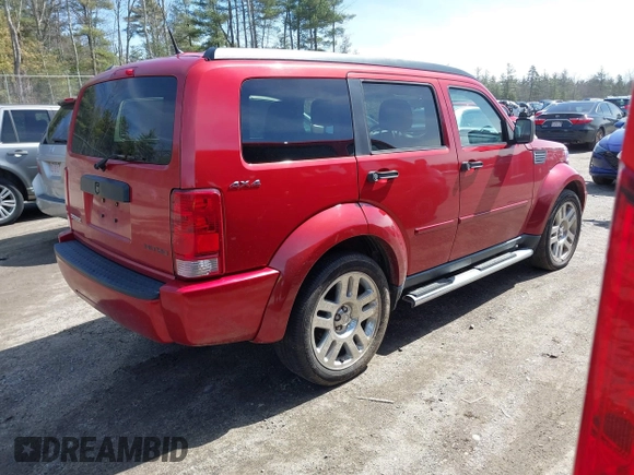 2011 Dodge Nitro Heat with VIN 1D4PU4GK2BW514520, listed as a IAAI auction lot 41919743 with 128,702 mi miles. Bid and sale history available at carsss.com. Image 4.