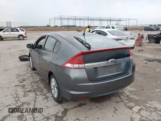 2012 Honda Insight EX z VIN JHMZE2H79CS004299, wystawiony jako IAAI lot #42296207 z przebiegiem 170 288 mil mil oraz . Historia ofert i sprzedaży dostępna na DreamBid. Obrazek 3.