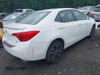 2017 Toyota Corolla L with VIN 2T1BURHE6HC842599, listed as a IAAI auction lot 42167623 with 71,130 mi miles and . Bid and sale history available at DreamBid. Image 4.