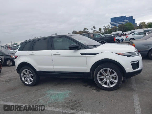 2016 Land Rover Range Rover Evoque SE z VIN SALVP2BG5GH078821, wystawiony jako IAAI lot #42074713 z przebiegiem 129 105 mil mil oraz . Historia ofert i sprzedaży dostępna na DreamBid. Obrazek 13.