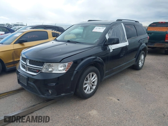2016 Dodge Journey SXT with VIN 3C4PDDBG3GT215910, listed as a IAAI auction lot 41798779 with 165,505 mi miles. Bid and sale history available at carsss.com. Image 2.