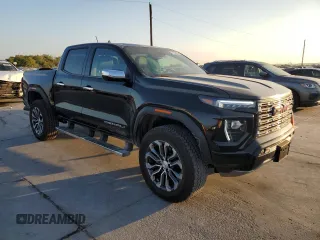 2023 GMC Canyon 4WD Denali with VIN 1GTP6FEK8P1164692, listed as a Copart auction lot 77033234 with 5,644 mi miles and Salvage Title. Bid and sale history available at carsss.com. Image 4.