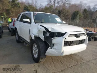 2021 Toyota 4Runner SR5 with VIN JTEEU5JR3M5239888, listed as a IAAI auction lot 41503559 with 154,147 mi miles. Bid and sale history available at carsss.com. Image 1.