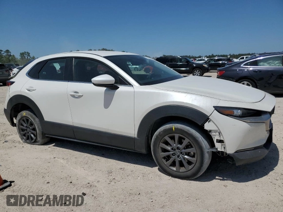 2023 Mazda CX-30 S with VIN 3MVDMBAM3PM575394, listed as a Copart auction lot 52531455 with 51,155 mi miles and Salvage title. Bid and sale history available at DreamBid. Image 4.