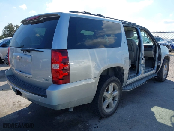 2012 Chevrolet Suburban LT with VIN 1GNSCJE01CR220186, listed as a IAAI auction lot 41476520 with 117,714 mi miles. Bid and sale history available at carsss.com. Image 4.