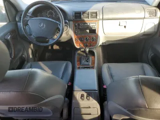 1999 Mercedes-Benz M-Class with VIN 4JGAB54E4XA101754, listed as a Copart auction lot 77903984 with 187,810 mi miles and Salvage Title. Bid and sale history available at carsss.com. Image 8.
