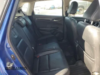 2015 Honda Fit EX-L z VIN 3HGGK5H8XFM785764, wystawiony jako Copart lot #52246635 z przebiegiem 308 947 mil mil oraz Czysty tytuł • Clean title. Historia ofert i sprzedaży dostępna na DreamBid. Obrazek 10.