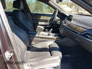 2016 BMW 7 Series 740i with VIN WBA7E2C54GG714649, listed as a IAAI auction lot 41815220 with 89,029 mi miles. Bid and sale history available at carsss.com. Image 5.