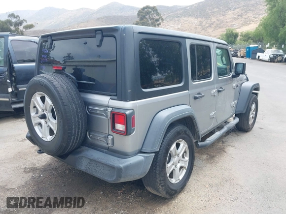 2018 Jeep Wrangler Unlimited Sport S with VIN 1C4HJXDN5JW145340, listed as a IAAI auction lot 42420695 with 92,500 mi miles and . Bid and sale history available at DreamBid. Image 4.