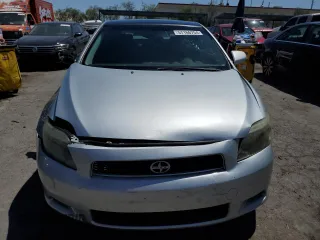 2005 Scion tC with VIN JTKDE177850022873, listed as a Copart auction lot 57166754 with 194,678 mi miles and Salvage Title. Bid and sale history available at carsss.com. Image 5.