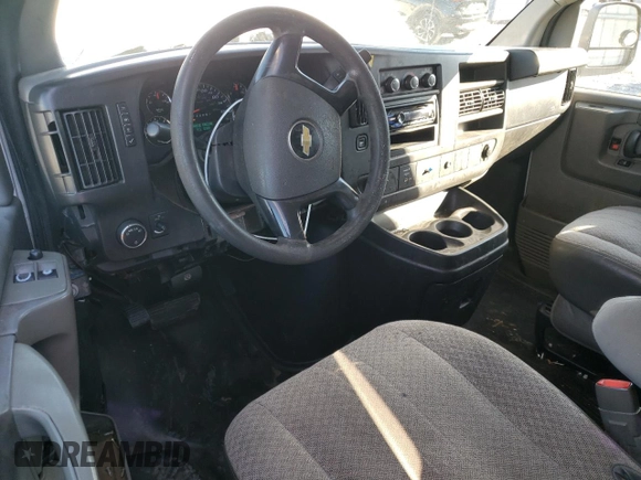 2012 Chevrolet Express Cargo z VIN 1GCWGFCAXC1184326, wystawiony jako Copart lot #88801015 z przebiegiem 393 415 mil mil oraz Szkoda całkowita • Salvage title. Historia ofert i sprzedaży dostępna na DreamBid. Obrazek 8.