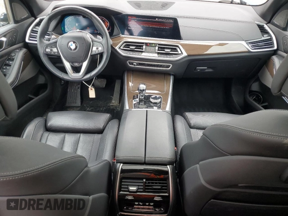 2021 BMW X5 xDrive40i with VIN 5UXCR6C01M9E49207, listed as a Copart auction lot 63399795 with 50,818 mi miles and Salvage title. Bid and sale history available at DreamBid. Image 8.