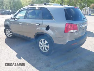 2012 Kia Sorento LX with VIN 5XYKT3A65CG266682, listed as a IAAI auction lot 42220120 with 118,153 mi miles and . Bid and sale history available at carsss.com. Image 3.