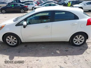 2012 Kia Rio EX with VIN KNADN5A37C6031494, listed as a IAAI auction lot 42052186 with 141,765 mi miles. Bid and sale history available at carsss.com. Image 14.