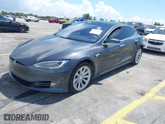 2016 Tesla Model S 70 with VIN 5YJSA1E16GF156312, listed as a IAAI auction lot 42469451 with 90,317 mi miles and . Bid and sale history available at DreamBid. Image 2.