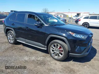 2021 Toyota RAV4 XLE Premium with VIN 2T3A1RFV6MC236809, listed as a IAAI auction lot 42056379 with 99,921 mi miles and . Bid and sale history available at DreamBid. Image 1.