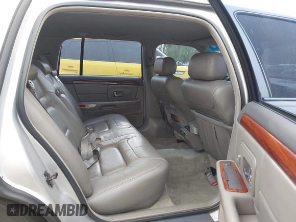 1999 Cadillac DeVille z VIN 1G6KD54Y6XU734741, wystawiony jako IAAI lot #42121114 z przebiegiem 152 829 mil mil oraz . Historia ofert i sprzedaży dostępna na DreamBid. Obrazek 8.
