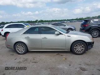 2013 Cadillac CTS Luxury with VIN 1G6DE5E55D0120843, listed as a IAAI auction lot 42145982 with 147,127 mi miles and . Bid and sale history available at DreamBid. Image 13.