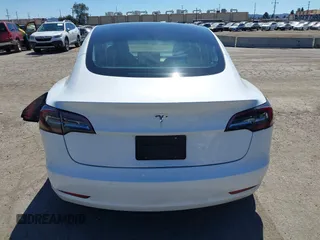 2019 Tesla Model 3 Mid Range with VIN 5YJ3E1EA1KF422983, listed as a IAAI auction lot 41861334 with 53,017 mi miles. Bid and sale history available at carsss.com. Image 16.