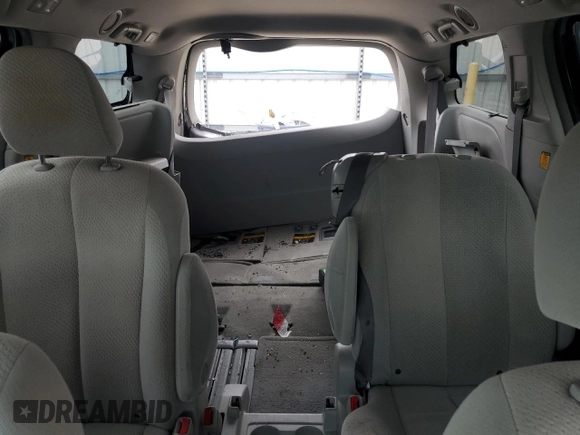 2012 Toyota Sienna LE AAS z VIN 5TDKK3DC0CS222967, wystawiony jako Copart lot #58044405 z przebiegiem 219 970 mil mil oraz Szkoda całkowita • Salvage title. Historia ofert i sprzedaży dostępna na DreamBid. Obrazek 10.