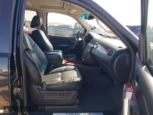 2013 Chevrolet Tahoe LTZ with VIN 1GNSKCE0XDR350970, listed as a IAAI auction lot 41704253 with 126,653 mi miles and . Bid and sale history available at DreamBid. Image 5.