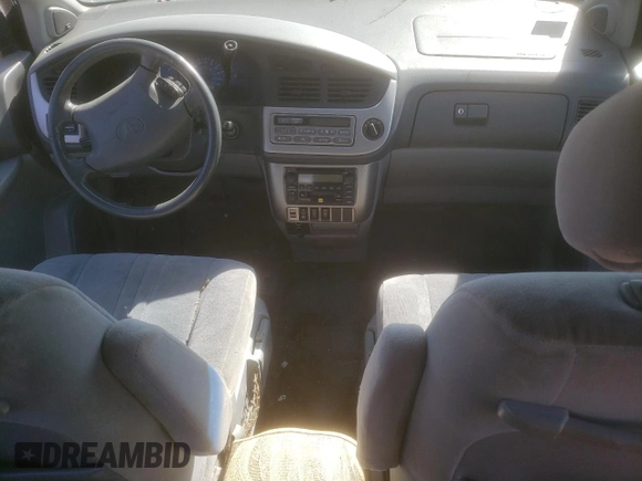 2002 Toyota Sienna LE with VIN 4T3ZF13C22U497021, listed as a Copart auction lot 52571055 with 232,973 mi miles and Salvage Title. Bid and sale history available at DreamBid. Image 8.