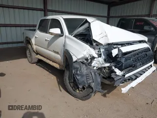 2021 Toyota Tacoma SR z VIN 3TMCZ5AN4MM373247, wystawiony jako IAAI lot #41982617 z przebiegiem 45 692 mil mil oraz . Historia ofert i sprzedaży dostępna na DreamBid. Obrazek 1.
