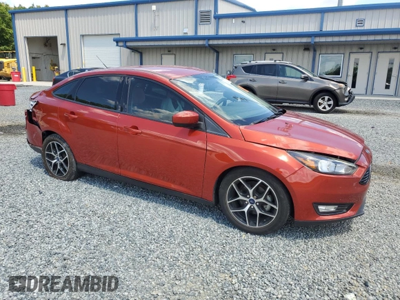 2018 Ford Focus SE with VIN 1FADP3FEXJL269131, listed as a Copart auction lot 55894765 with 33,752 mi miles and Salvage title. Bid and sale history available at DreamBid. Image 4.