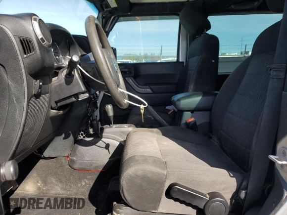 2012 Jeep Wrangler Sport z VIN 1C4AJWAG3CL151885, wystawiony jako Copart lot #51682175 z przebiegiem 111 544 mil mil oraz Szkoda całkowita • Salvage title. Historia ofert i sprzedaży dostępna na DreamBid. Obrazek 7.