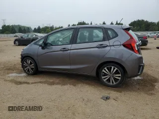 2015 Honda Fit EX-L z VIN 3HGGK5H85FM763929, wystawiony jako Copart lot #60808125 z przebiegiem 79 441 mil mil oraz Szkoda całkowita • Salvage title. Historia ofert i sprzedaży dostępna na DreamBid. Obrazek 2.