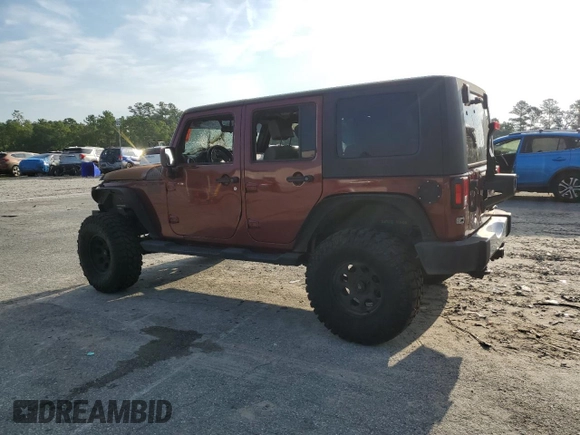 2010 Jeep Wrangler Unlimited Sahara with VIN 1J4BA5H13AL141851, listed as a Copart auction lot 63486504 with 0 mi miles and Salvage Title. Bid and sale history available at carsss.com. Image 2.