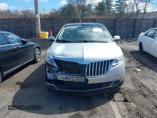2014 Lincoln MKX with VIN 2LMDJ8JK4EBL10705, listed as a IAAI auction lot 41870228 with 166,527 mi miles and . Bid and sale history available at DreamBid. Image 12.