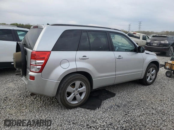 2010 Suzuki Grand Vitara Limited z VIN JS3TE0D73A4100112, wystawiony jako Copart lot #50907365 z przebiegiem 146 484 mil mil oraz Szkoda całkowita • Salvage title. Historia ofert i sprzedaży dostępna na DreamBid. Obrazek 3.