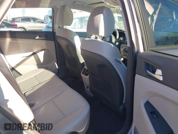 2019 Hyundai Tucson Ultimate with VIN KM8J3CAL9KU004559, listed as a IAAI auction lot 41142923 with 95,396 mi miles. Bid and sale history available at carsss.com. Image 8.