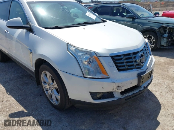 2014 Cadillac SRX Performance Collection with VIN 3GYFNFE35ES582897, listed as a IAAI auction lot 41978361 with 144,116 mi miles and . Bid and sale history available at DreamBid. Image 6.