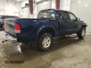 2002 Dodge Dakota SLT with VIN 1B7HG48N12S653207, listed as a Copart auction lot 86149264 with 215,021 mi miles and Salvage Title. Bid and sale history available at carsss.com. Image 3.
