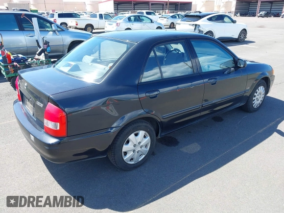 1999 Mazda Protege DX z VIN JM1BJ2228X0108327, wystawiony jako IAAI lot #41630708 z przebiegiem 171 459 mil mil oraz . Historia ofert i sprzedaży dostępna na DreamBid. Obrazek 4.