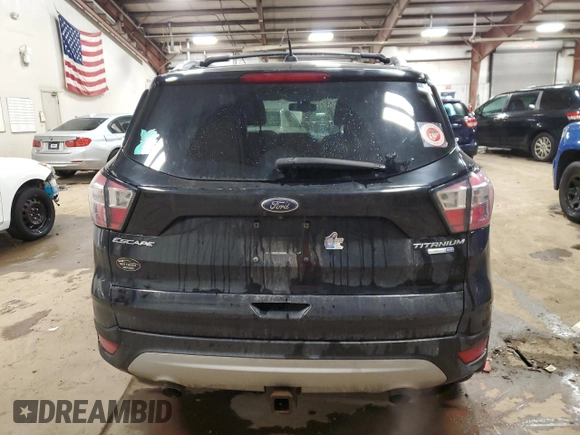 2017 Ford Escape Titanium with VIN 1FMCU9J91HUC68669, listed as a Copart auction lot 43190965 with 161,347 mi miles and Clean Title. Bid and sale history available at carsss.com. Image 6.