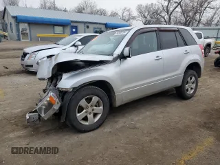 2012 Suzuki Grand Vitara Premium z VIN JS3TD0D66C4100621, wystawiony jako Copart lot #86968164 z przebiegiem Nie podano mil oraz Szkody całkowita. Historia ofert i sprzedaży dostępna na DreamBid. Obrazek 1.