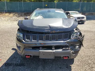 2017 Jeep Compass Trailhawk with VIN 3C4NJDDBXHT668053, listed as a Copart auction lot 63032155 with 94,090 mi miles and Salvage title. Bid and sale history available at DreamBid. Image 5.