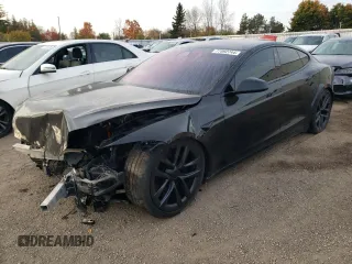 2021 Tesla Model S Plaid with VIN 5YJSA1E6XMF455292, listed as a Copart auction lot 77092744 with 0 mi miles and Salvage Title. Bid and sale history available at carsss.com. Image 1.