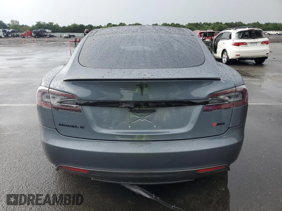 2014 Tesla Model S 60 with VIN 5YJSA1H14EFP28471, listed as a Copart auction lot 64928534 with 99,442 mi miles and Clean Title. Bid and sale history available at DreamBid. Image 6.
