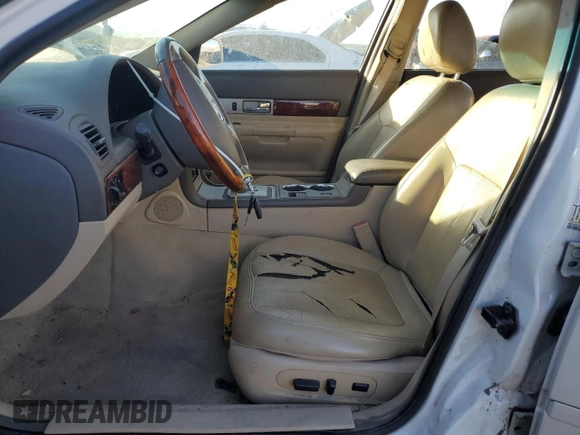 2006 Lincoln LS Sport z VIN 1LNFM87A36Y640950, wystawiony jako Copart lot #56752845 z przebiegiem 117 760 mil mil oraz Czysty tytuł • Clean title. Historia ofert i sprzedaży dostępna na DreamBid. Obrazek 7.