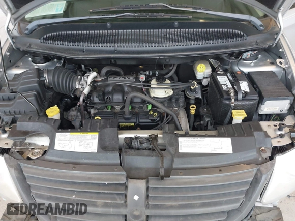 2005 Dodge Caravan SE with VIN 1D4GP24R85B351591, listed as a IAAI auction lot 41949337 with 130,821 mi miles and . Bid and sale history available at DreamBid. Image 10.